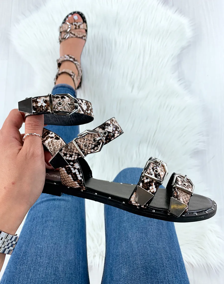 Flat python print sandals with buckles.