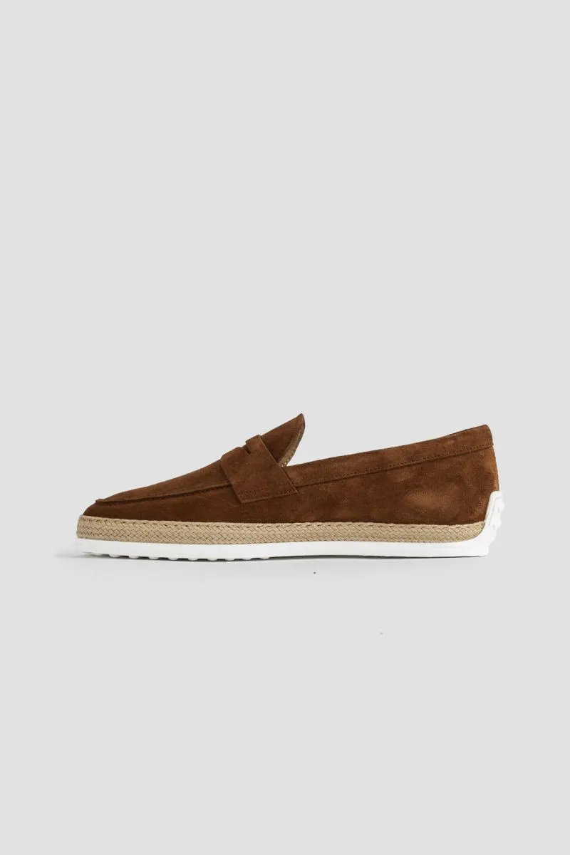 Brown suede leather moccasins.