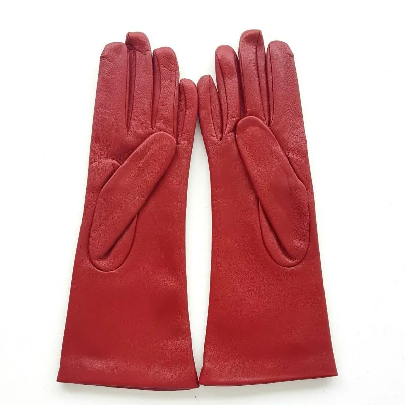 Red silk lined lamb leather gloves | Pair of red leather gloves with silk lining.
