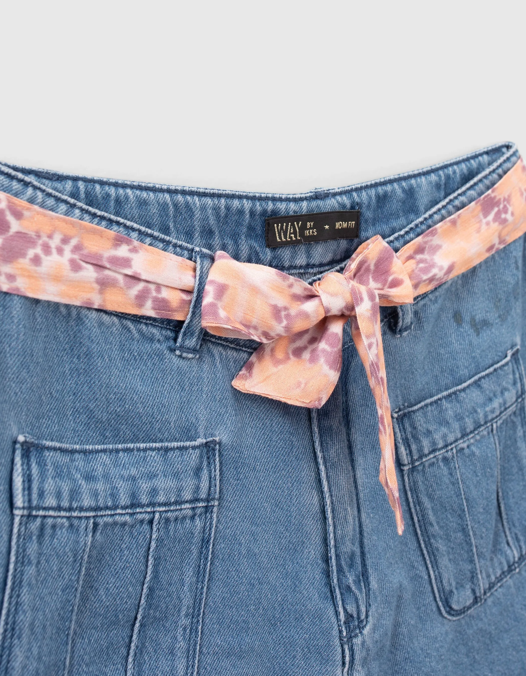 Short jeans skirt with psychedelic flower belt for girl.